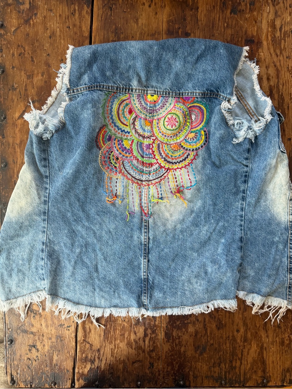 Hand embroidered and upcycled vest